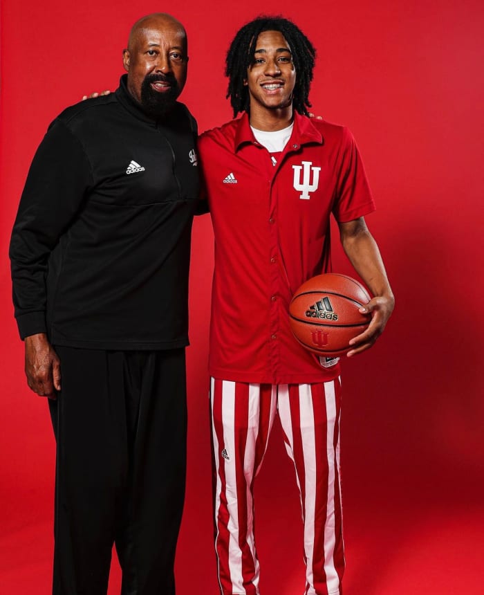 Boogie Fland, a five-star point guard in the class of 2024, is pictured with Indiana coach Mike Woodson during an official visit to Bloomington in June.